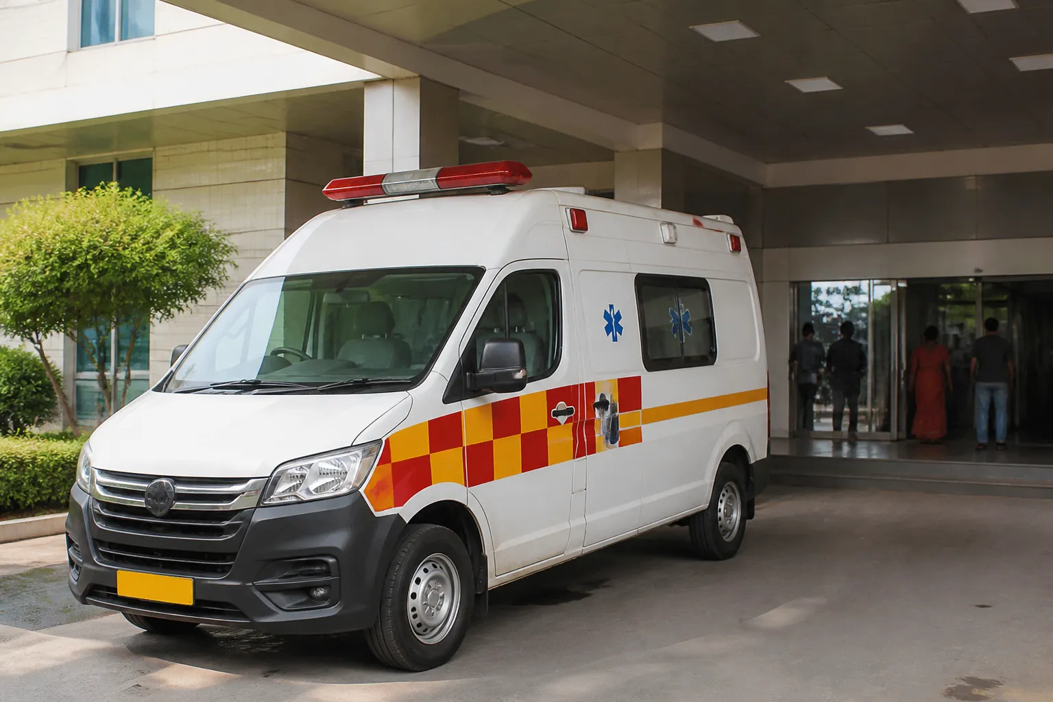 Ambulance parked outside a hospital entrance